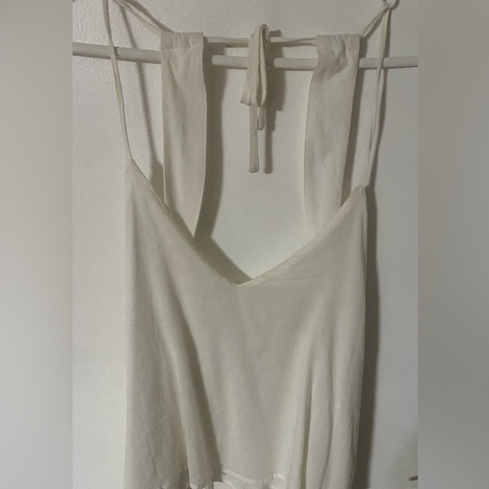 Sexy TOBI top. Size L. Very condition. It’s more of an off white. Super cute